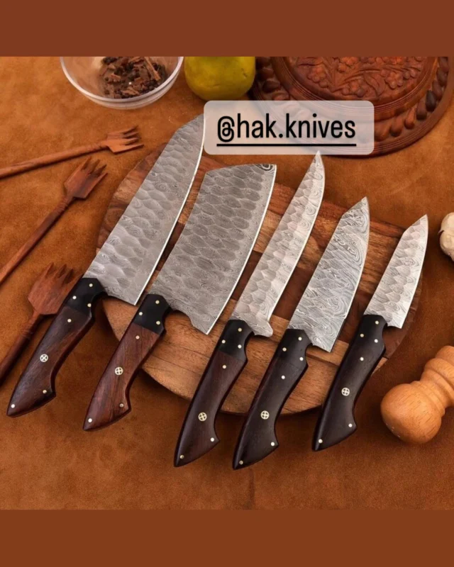 #knife #knifelife #knifestagram #knifemaking #knifemaker#knifepics #knifefanatics#edcknife #customknife #knifeparty #knifenuts #knifeart #knifefanatic #knifeaddiction #pocketknife #knifeobsession #chefknife #damascus #knife #knives #swordartonline #axe #leathersheath #christmas #knifefanatics #usa🇺🇸 #canada🇨🇦 #europe🇪🇺#spain🇪🇸#londonlife #turkey🇹🇷 #france🇫🇷 *DETAILS* Kitchen Knives Set Damascus Steel Chef Knives Set Birthday Gift Anniversary Gift Corporate Gifts Thanksgiving Gifts Holiday Christmas Gifts BLADE MATERIAL Damascus Steel (1095 and 15n20) HANDLE MATERIAL Wood / Black G10 / Mosaic Pin Experience the artistry and performance of a handmade Damascus steel chef set with wooden handles. Each knife in this set is a unique work of art, with a blade forged from layers of high-carbon and low-carbon steel, creating a distinctive pattern and exceptional sharpness. The wooden handles are ergonomically designed for comfort and grip, and are available in a variety of woods to suit your taste. This chef set includes all the knives you need to prepare any meal, from chopping vegetables to slicing meat to carving poultry. The blades are ultra-sharp and durable, making it easy to glide through even the toughest ingredients. The wooden handles are comfortable to hold and provide a good grip, even when wet. Whether you’re a professional chef or simply a home cook who loves to cook, this handmade Damascus steel chef set is a must-have for any kitchen.